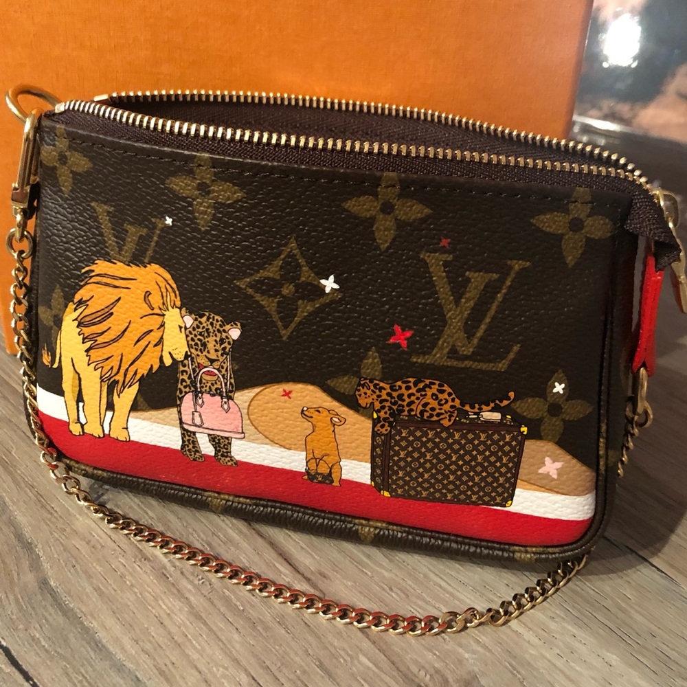 🦁❤️Louis Vuitton Mini Pochette Lion❤️🦁
